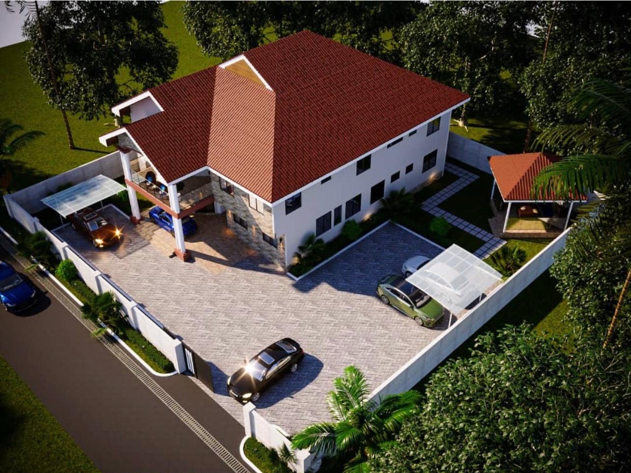 Aerial view of a residence and landscaped compound